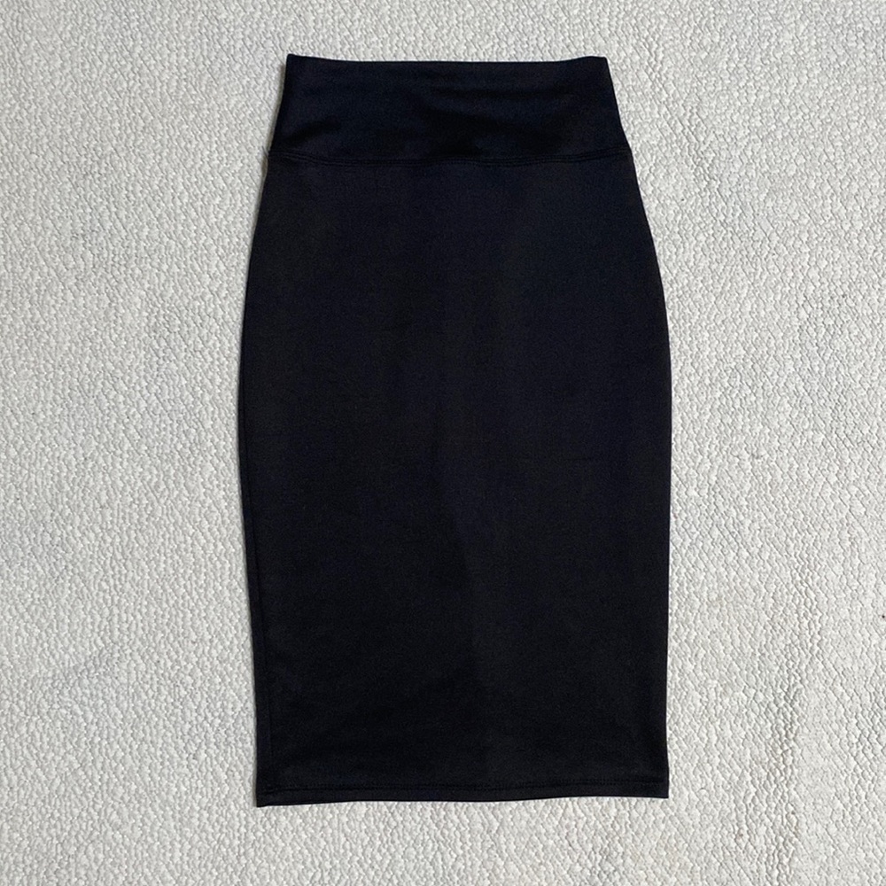 Size small pencil skirt with slit in the back.